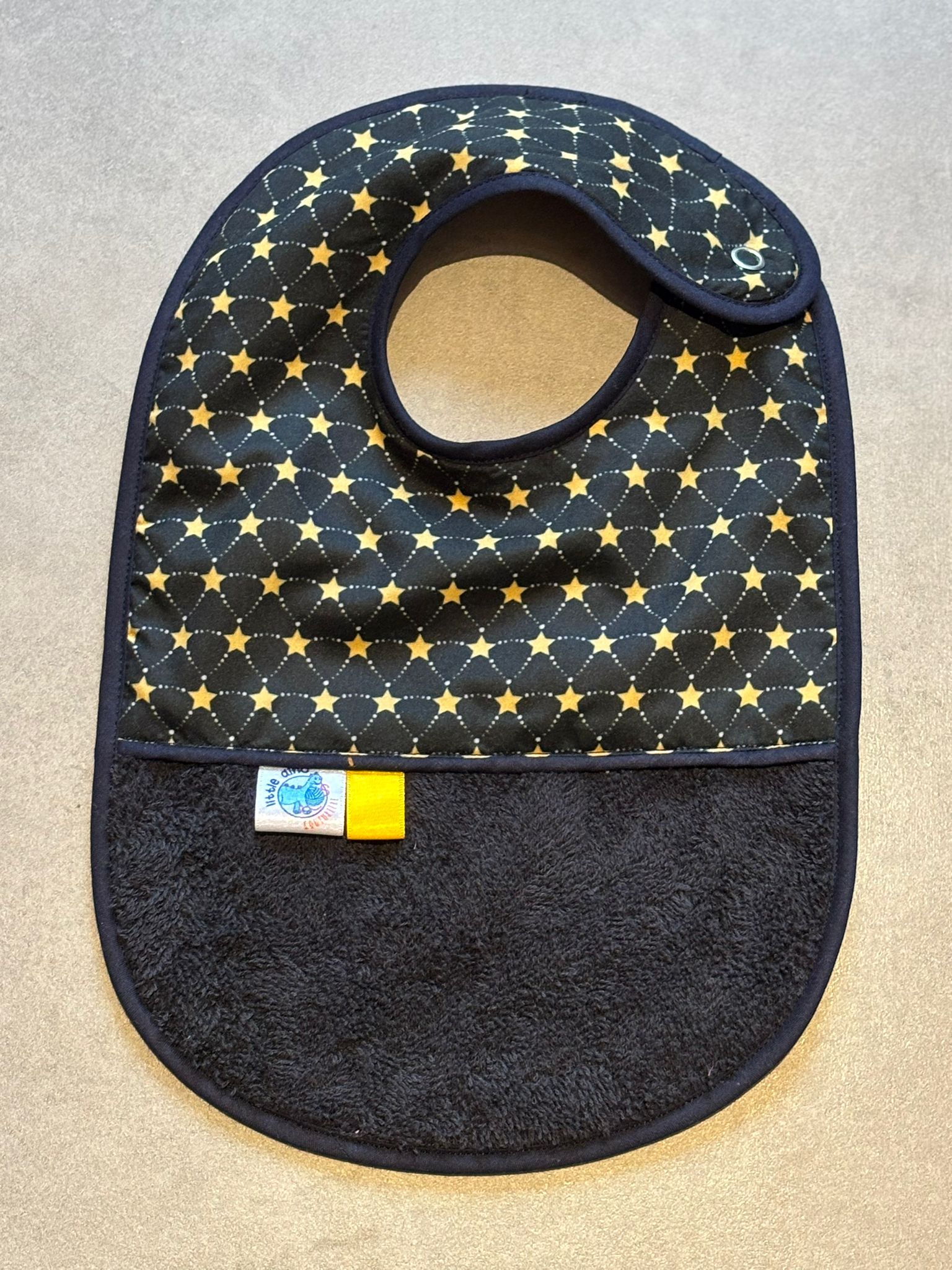 Bavoir OEKO-TEX® – Motif Étoiles Noir & Or